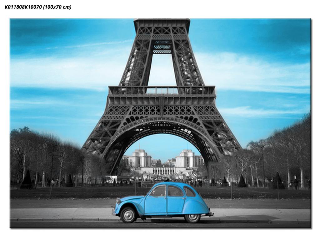 Slika Eiffelovega stolpa in modrega avtomobila
