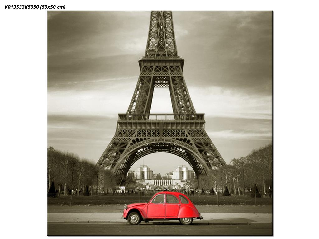 Slika Eiffelovog tornja i crveni automobil