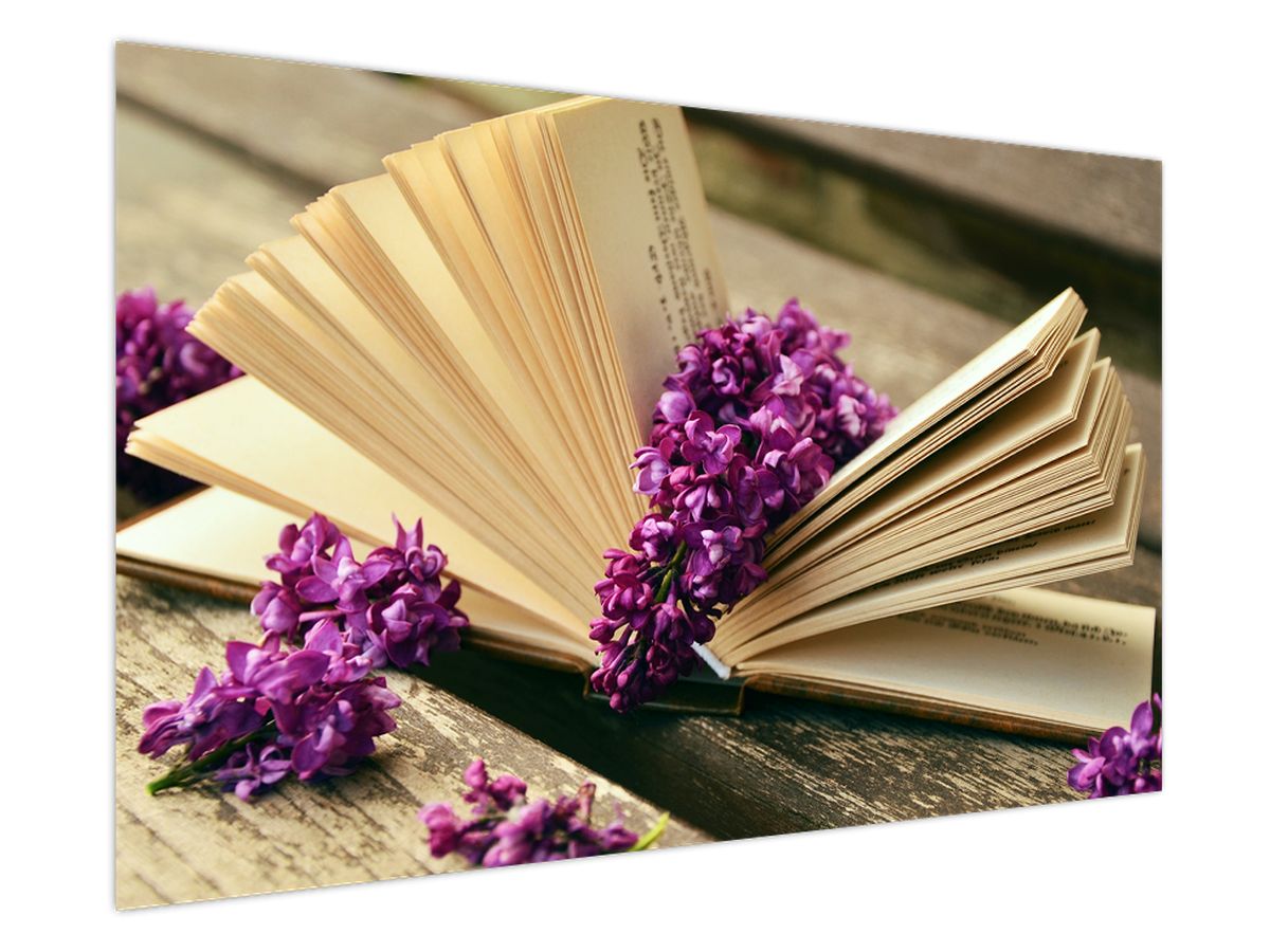 Leinwandbild eines Buches und einer lila Blume